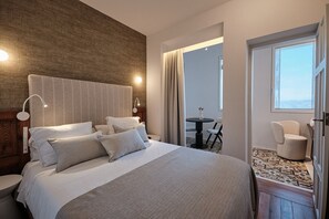 ジュニア スタジオスイート ガーデンビュー | ミニバー、セーフティボックス (室内)、デスク、ノートパソコン用作業スペース