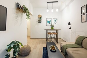 Apartment, 2 Bedrooms, Kitchen, City View | Living room | 43-inch Smart TV with digital channels, streaming services