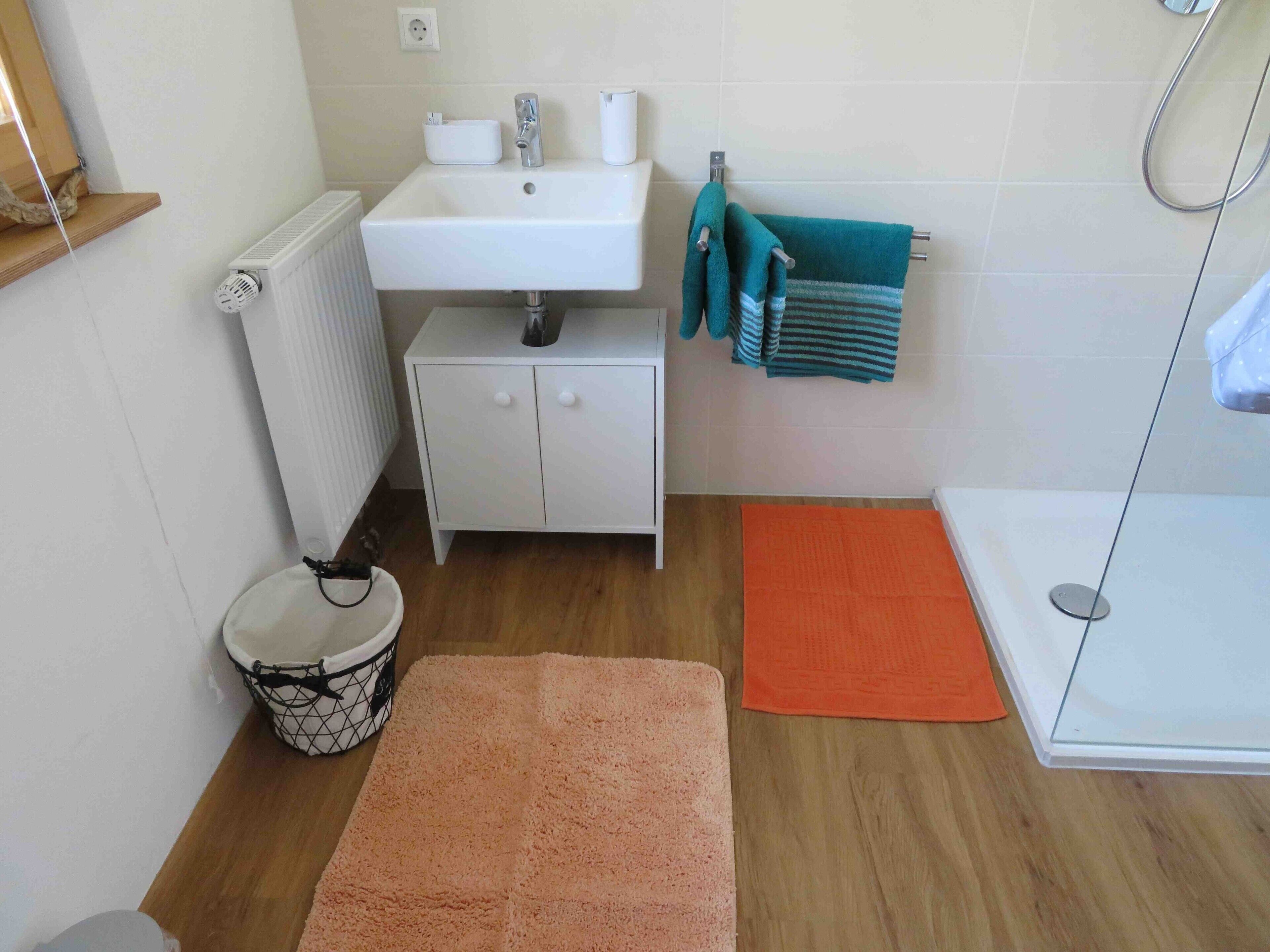 Shower, free toiletries, hair dryer, towels