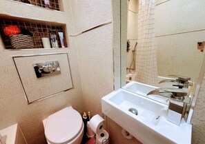 Hair dryer, towels, soap, shampoo