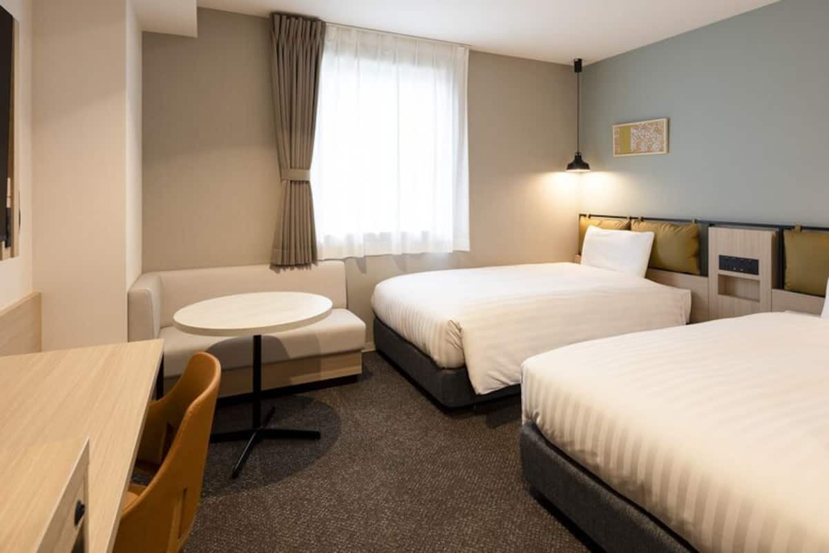 Luxe beddengoed, verduisterende gordijnen, gratis wifi, beddengoed