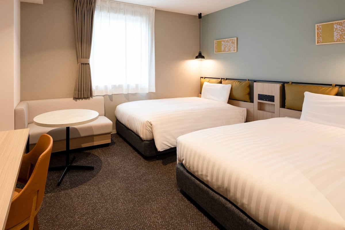 Standardrum - 2 enkelsÀngar - icke-rökare | SÀngtillbehör av högsta kvalitet, mörklÀggningsgardiner och gratis wi-fi