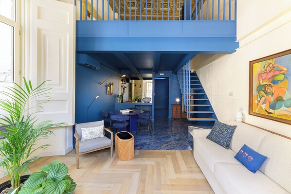 Deluxe Suite, Balcony | In-room safe, blackout drapes, soundproofing, iron/ironing board