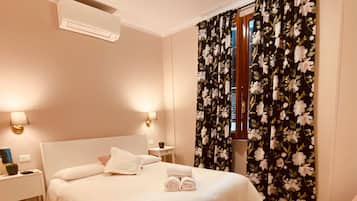 1 slaapkamer, een strijkplank/strijkijzer, wifi, beddengoed