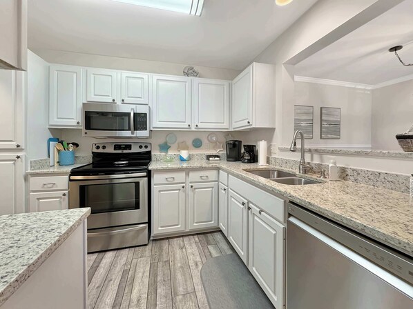 Condo, Multiple Beds, Patio, Garden View (Coastal Retreat) | Private kitchen | Fridge, microwave, oven, stovetop