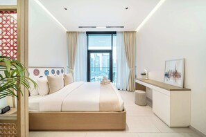 Fer et planche à repasser, lit parapluie, Wi-Fi, draps fournis