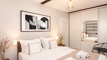 Apartemen Khas, pemandangan halaman | Setrika/meja setrika, tempat tidur bayi, Wi-Fi gratis, dan seprai linen