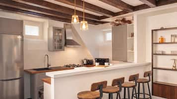 Signature Apartment, Courtyard View | Living area | 108-cm Smart TV with digital channels