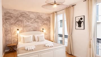 Iron/ironing board, travel crib, free WiFi, bed sheets