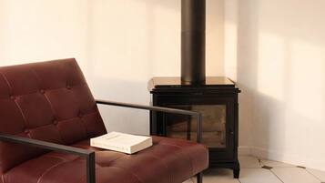 Signature Apartment, Courtyard View | Living area | 108-cm Smart TV with digital channels