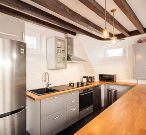 Signature Apartment, Courtyard View | Private kitchen | Espresso maker, electric kettle, toaster, freezer