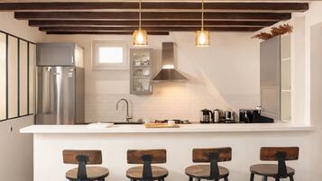 Signature Apartment, Courtyard View | Living area | 108-cm Smart TV with digital channels