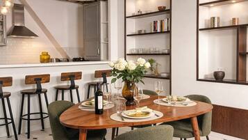 Signature Apartment, Courtyard View | Living area | 108-cm Smart TV with digital channels