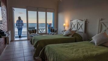 Standard Room, Beach View | Minibar, in-room safe, blackout drapes, free cribs/infant beds