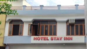A two-story building with a sign reading "HOTEL STAY INN". - HOTEL STAY INN (Lucknow)
