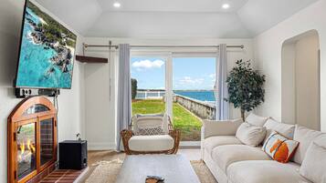 Apartment, 2 Bedrooms, Patio, Ocean View | Living area | 36-inch Smart TV with digital channels