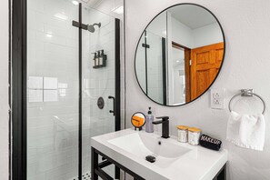 Apartment, 1 King Bed, Patio, Ocean View | Bathroom | Slippers - Blue Water (Southampton Parish)