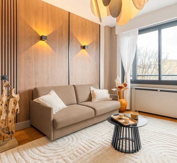 Superior Apartment, Garden View | Living area | 80-cm Smart TV with digital channels - 1598 Ingres (Paris)