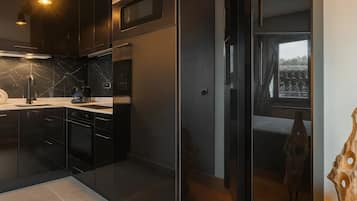 Superior Apartment, Garden View | Private kitchen | Espresso maker, electric kettle, toaster, freezer