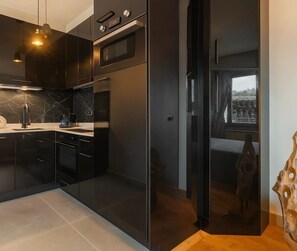 スーペリア アパートメント ガーデンビュー | 専用キッチン | エスプレッソマシン、電気ポット、トースター、冷凍庫