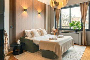 Superior Apartment, Garden View | Living area | 80-cm Smart TV with digital channels - 1598 Ingres (Paris)