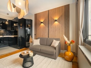Superior Apartment, Garden View | Living area | 80-cm Smart TV with digital channels - 1598 Ingres (Paris)