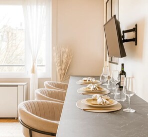 Superior Apartment, Garden View | Living area | 80-cm Smart TV with digital channels - 1598 Ingres (Paris)