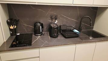 Fridge, microwave, electric kettle, toaster