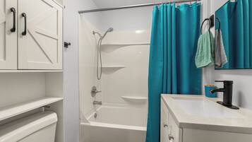 Hair dryer, towels, soap, shampoo