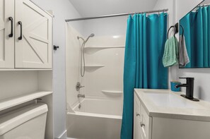 Hair dryer, towels, soap, shampoo