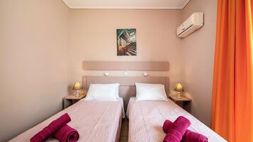 Classic Triple Room, Balcony, Garden View | Free WiFi