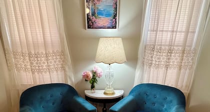 1.5 blocks to beach, sleeps 4, front porch & beach passes! Charming & spacious