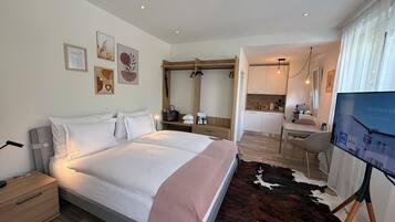 Classic Studio, Balcony | In-room safe, desk, laptop workspace, blackout drapes