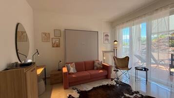Suite, Balcony | In-room safe, desk, laptop workspace, blackout curtains