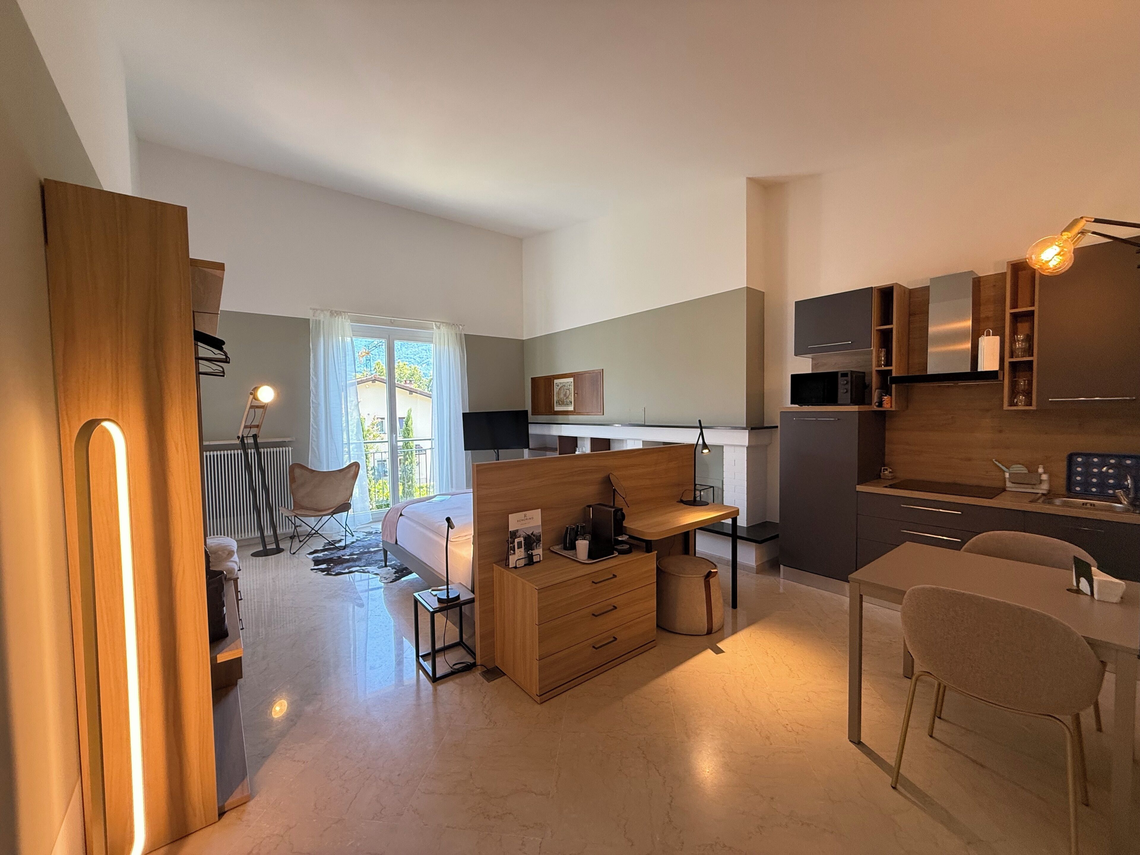 Deluxe Studio, Balcony | In-room safe, desk, laptop workspace, blackout drapes