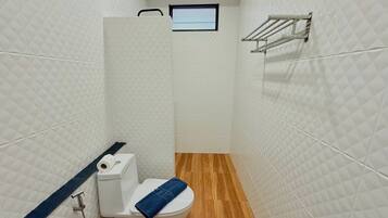 Shower, jetted tub, hair dryer, bidet