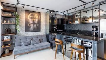 Comfort Apartment | Living area | TV