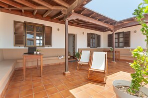 Terrace/patio - Vacation 'Dragón Y Suerte Lajares Pool' with Mountain View, Shared Pool and Wi-Fi (lajares)