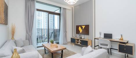 Luxury Apartment, Balcony, City View | Living area | 55-inch Smart TV with cable channels