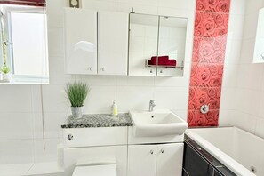 Separate bathtub and shower, deep-soaking bathtub, free toiletries