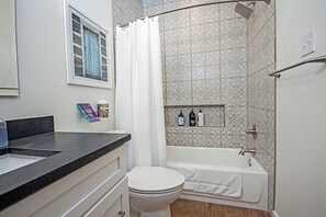 Hair dryer, towels, soap, shampoo