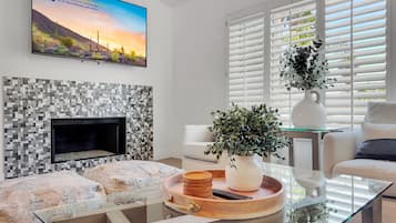 House, Multiple Beds, Pool Access, Pool View (Juniper Scottsdale) | Living area | Fireplace