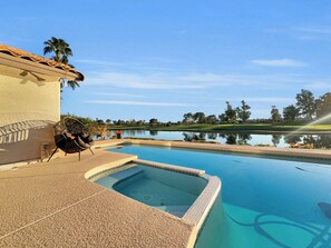 A swimming pool with a view of a golf course and a body of water. - Oleander 2 Chandler/ocotillo (Chandler)