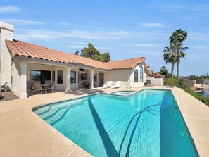A poolside area with a tiled roof, outdoor seating, and a view of the pool. - Oleander Ocotillo Chandler Complex (Chandler)