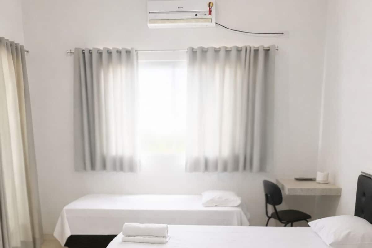 Triple Room, 3 Twin Beds | Laptop workspace, free WiFi