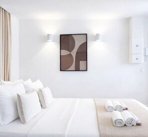 Premium Studio, Courtyard View | Living area | 80-cm Smart TV with digital channels