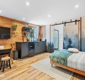 1 slaapkamer, een strijkplank/strijkijzer, reisbedje, gratis wifi