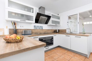 Oven, stovetop, dishwasher, coffee/tea maker