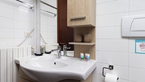 Hair dryer, bidet, towels