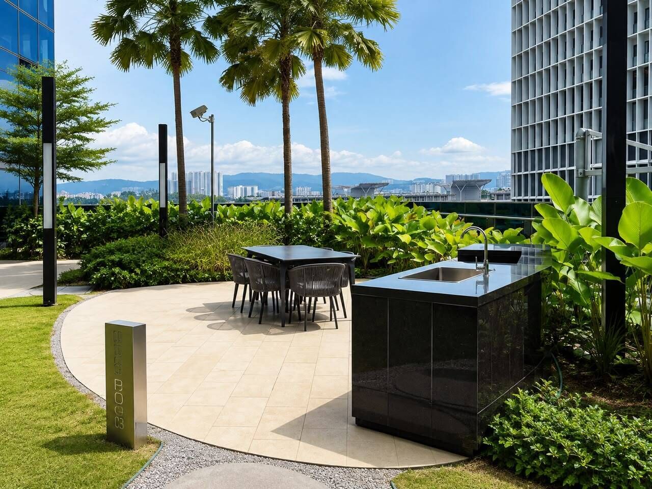 An outdoor seating area with a table and chairs, surrounded by greenery and a modern building in the background.